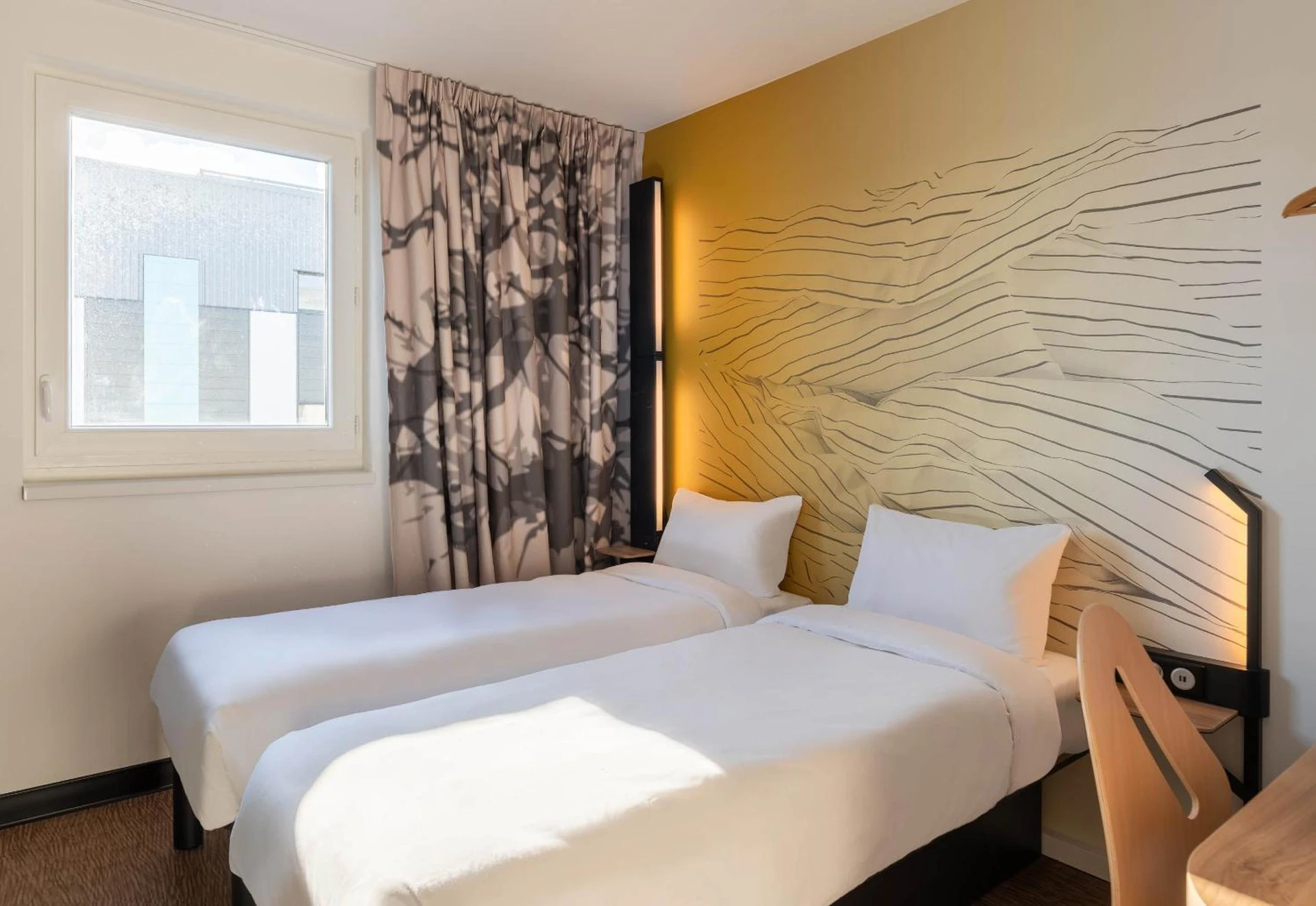 Magnifique chambre pour un séminaire d'entreprise à B&B HOTEL Massieux Genay - Genay