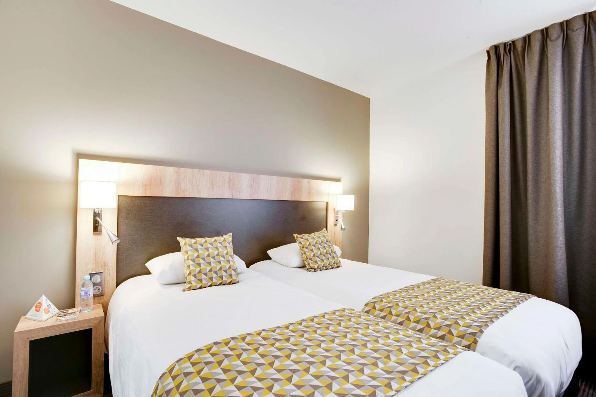 Chambre disponible pour un séminaire d'entreprise à Brit Hotel Confort Loches - Loches