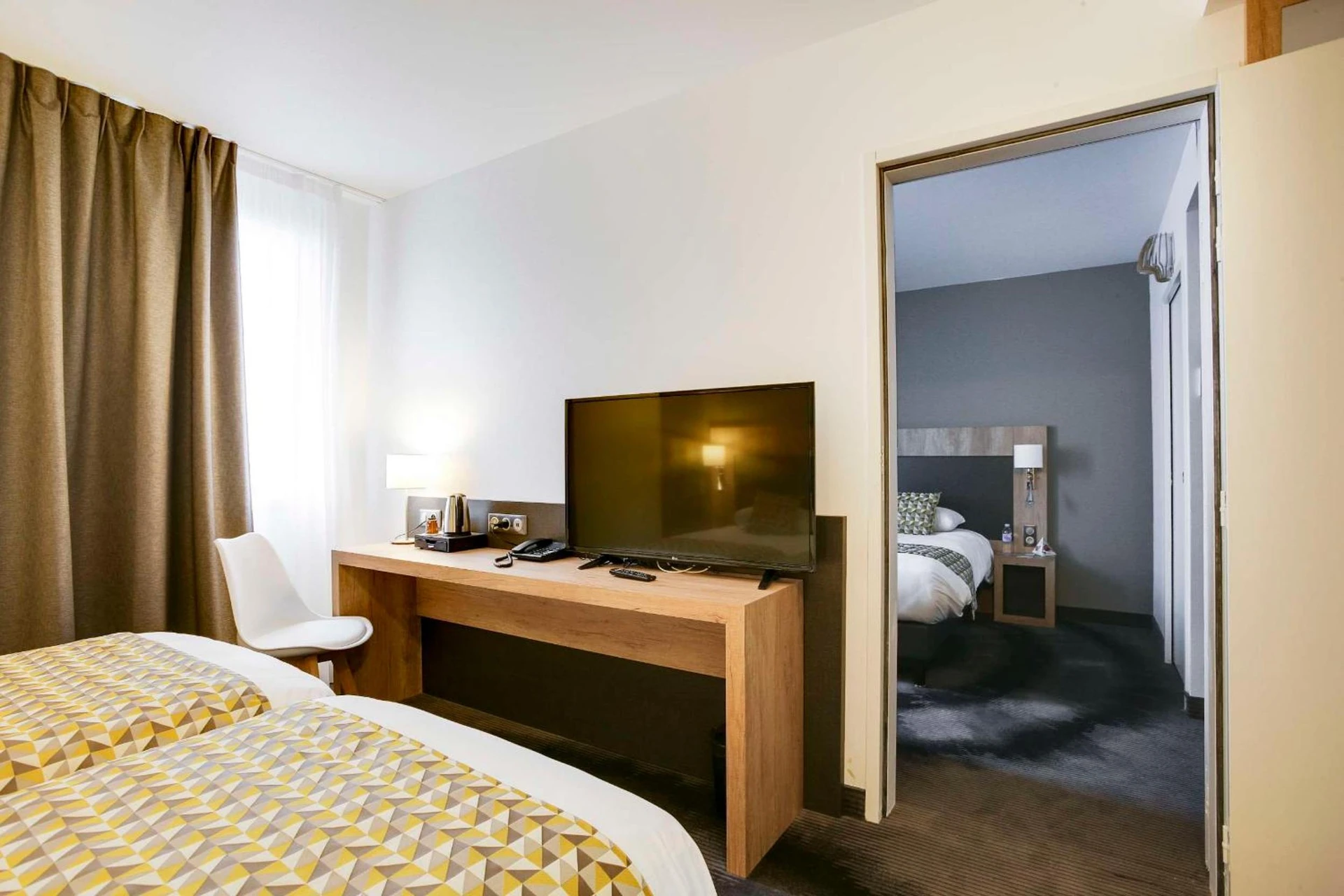 Chambre disponible pour un séminaire d'entreprise à Brit Hotel Confort Loches - Loches