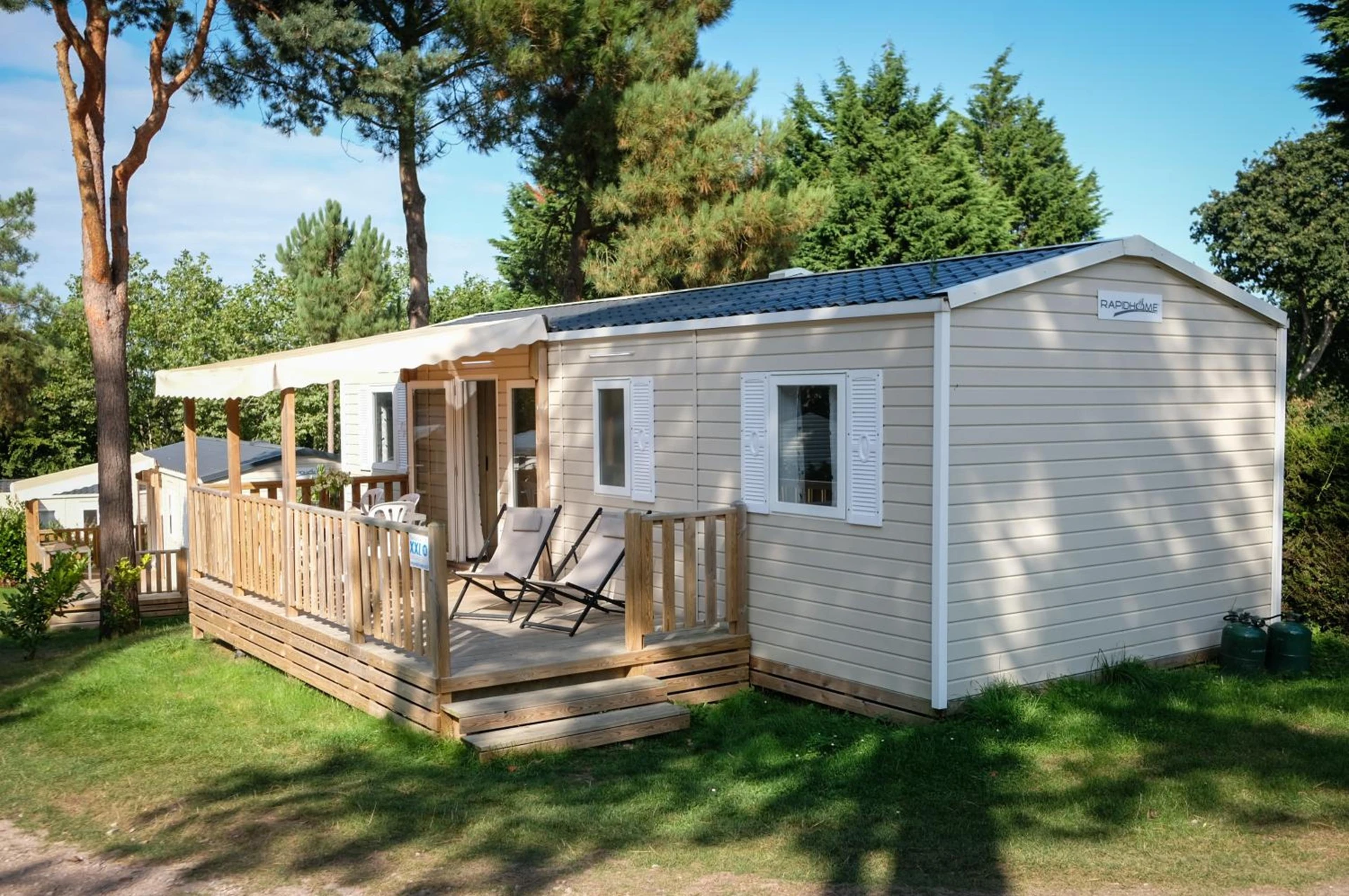 Chambre à Mobil Home XXL 4 chambres - Camping À l'Ombre des Tilleuls - Organiser un séminaire d'entreprise à Peyrouse