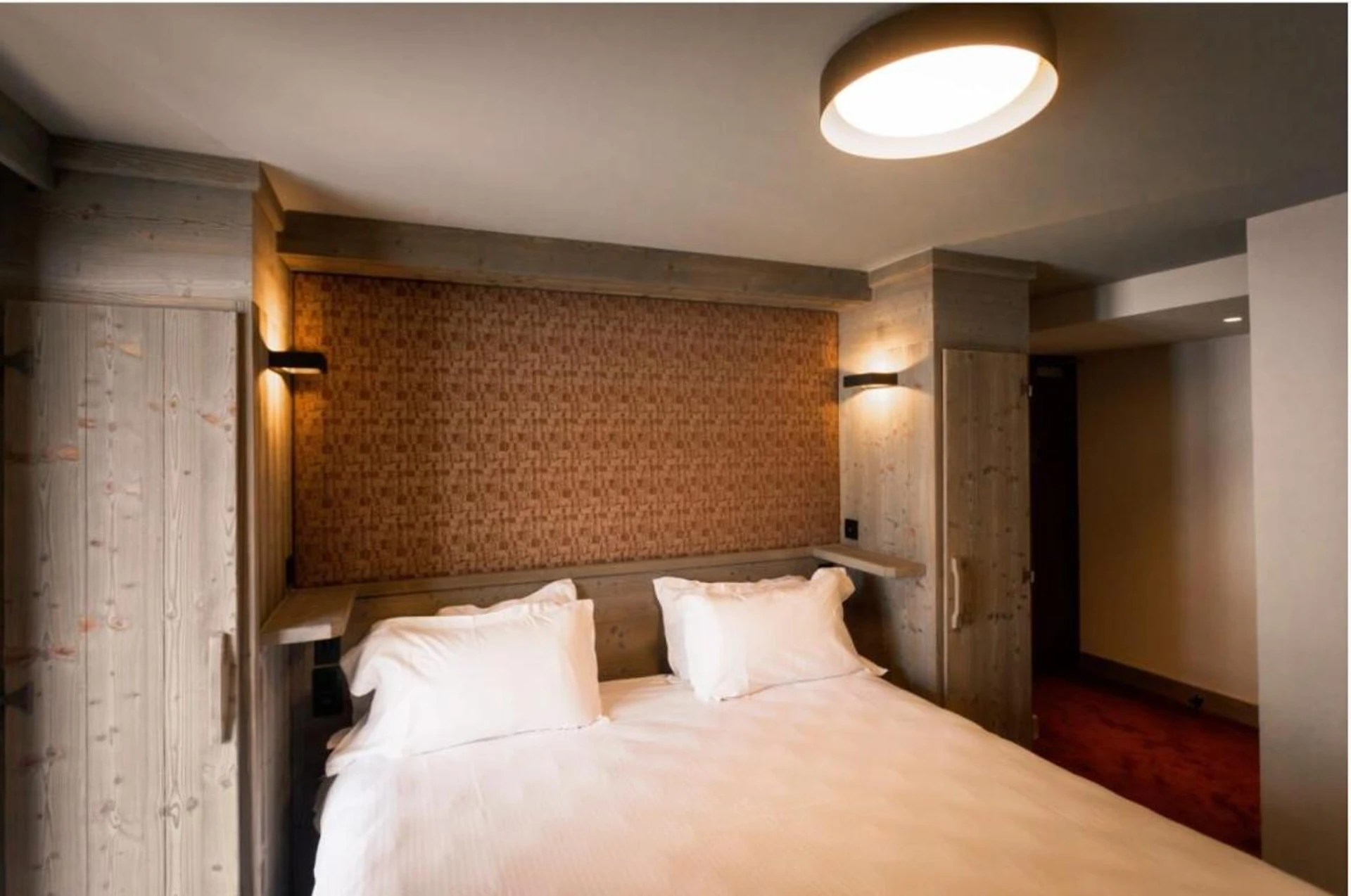 Chambre à Hôtel L'Aigle du Montana by Les Etincelles - Organiser un séminaire d'entreprise à Tignes