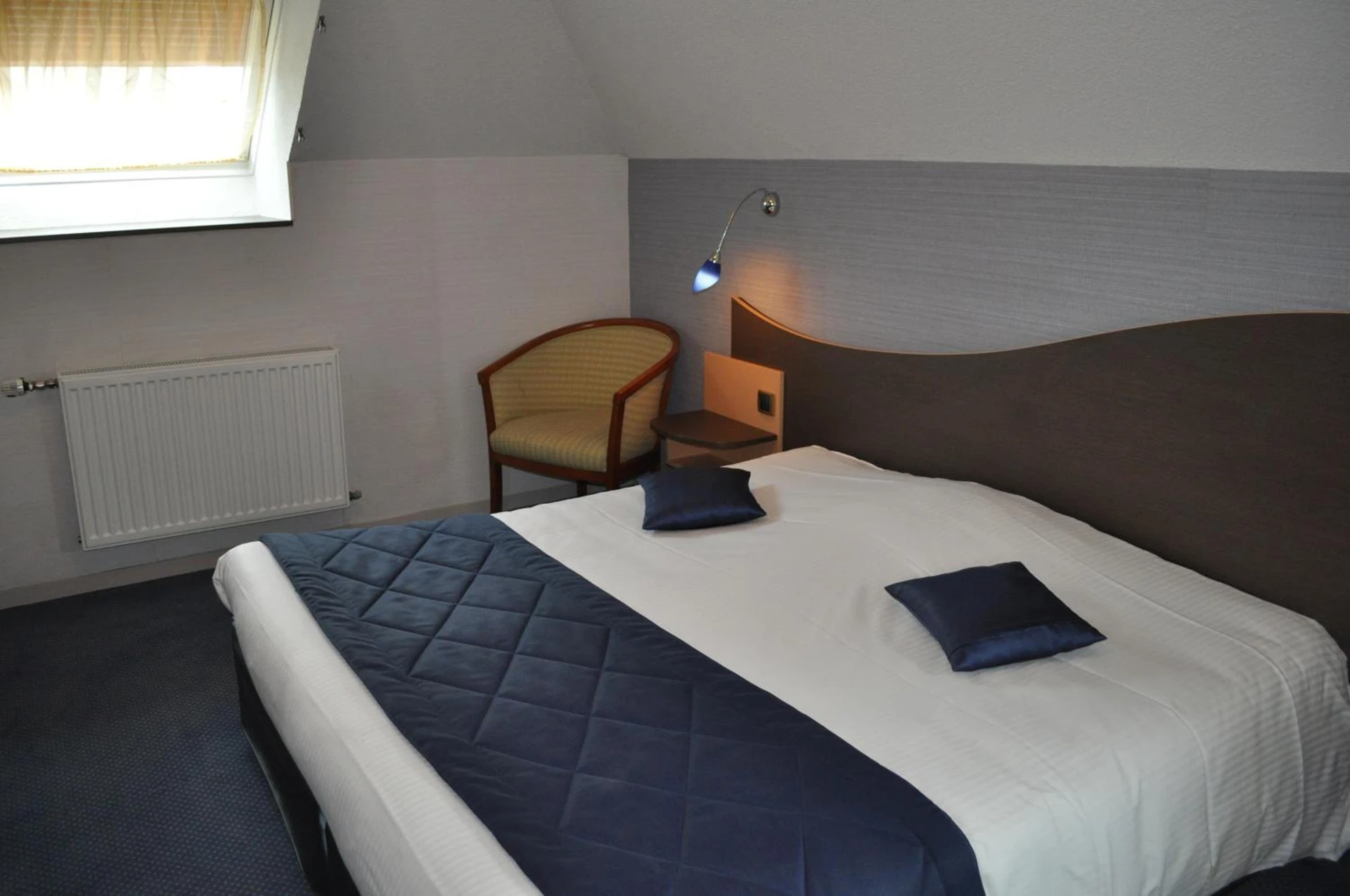 Magnifique chambre pour un séminaire d'entreprise à Logis Hotel au tambour - Reims