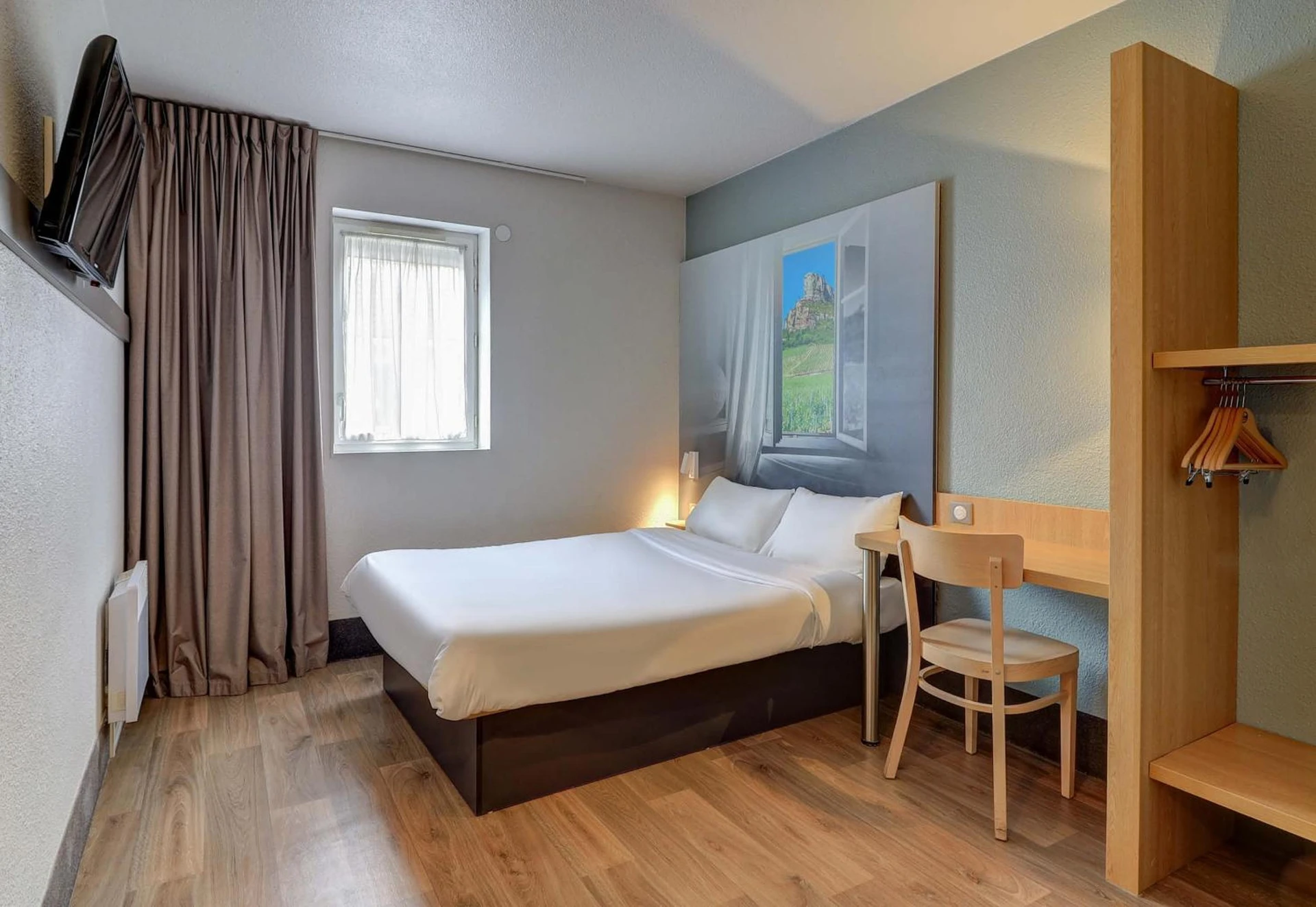 Magnifique chambre pour un séminaire d'entreprise à B&B HOTEL Chalon-Sur-Saone Sud - Suresnes
