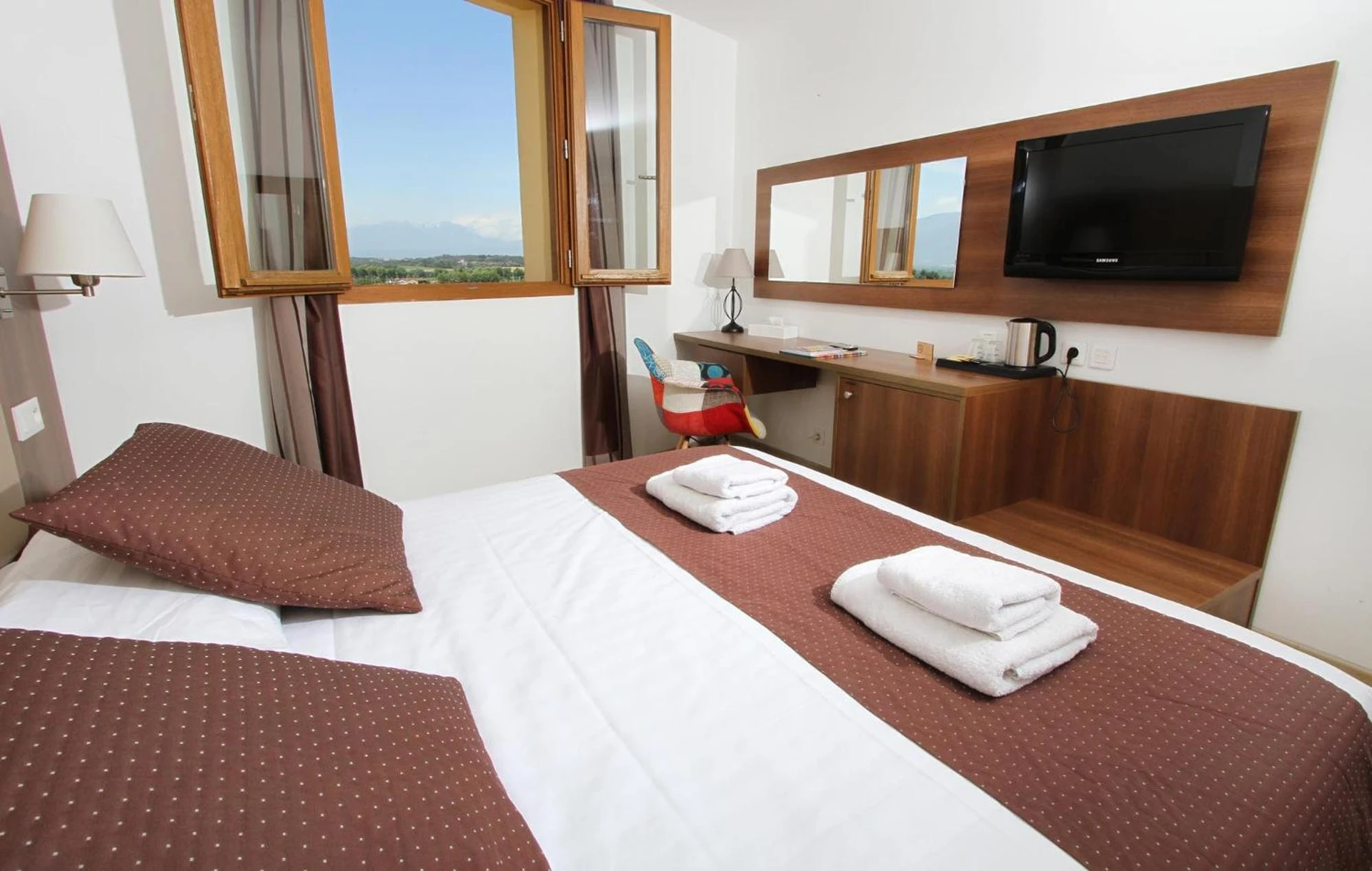 Magnifique chambre pour un séminaire d'entreprise à Logis Hotel Cara Sol - Elne