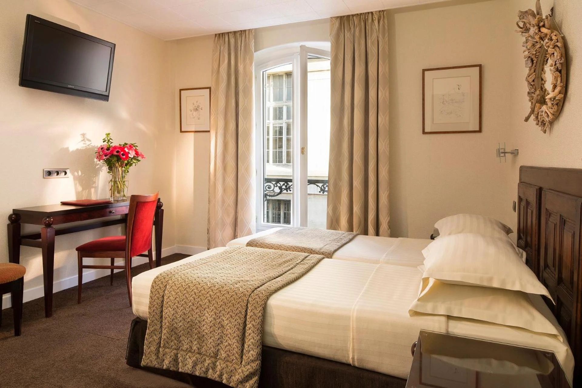 Chambre à Hôtel Delavigne - Organiser un séminaire d'entreprise à Paris