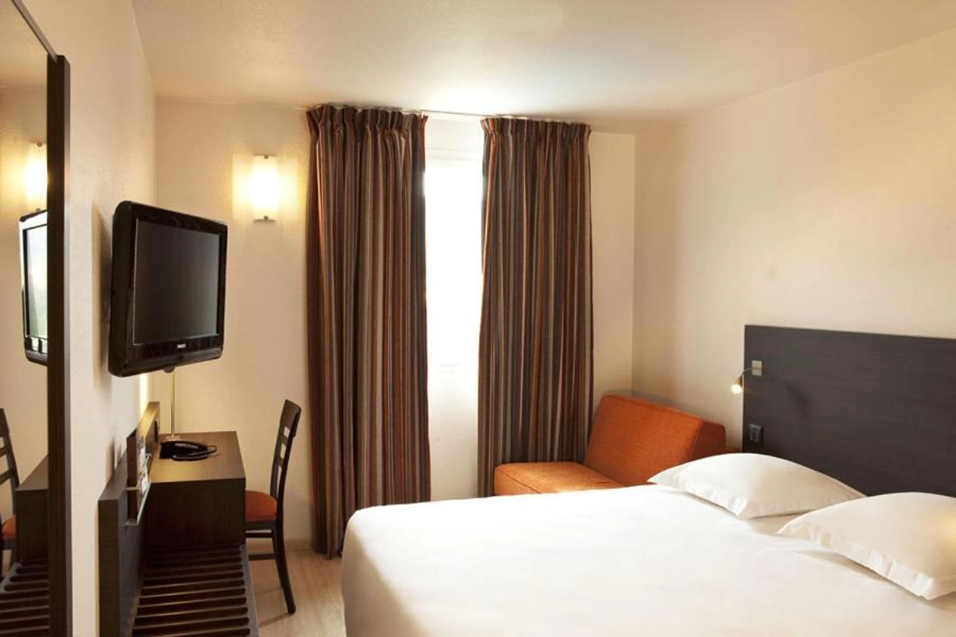 Chambre disponible pour un séminaire d'entreprise à Escale Oceania Nantes Aéroport - Bouguenais