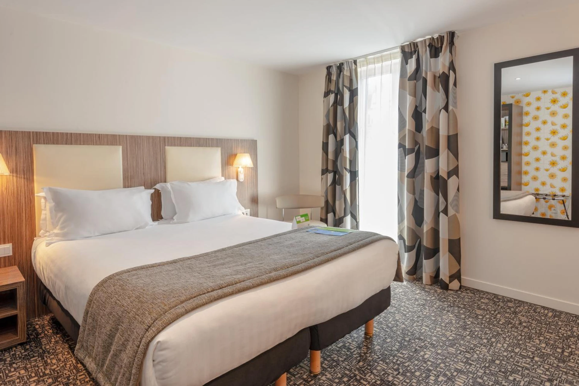 Chambre disponible pour un séminaire d'entreprise à Holiday Inn Paris Opéra - Grands Boulevards by IHG - Paris