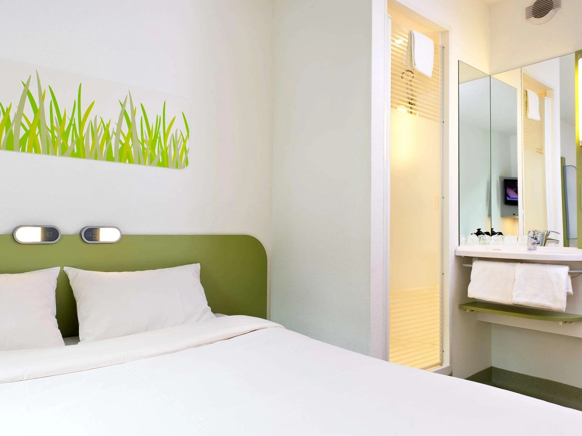 Magnifique chambre pour un séminaire d'entreprise à Ibis Budget Roanne Hôtel - Roanne