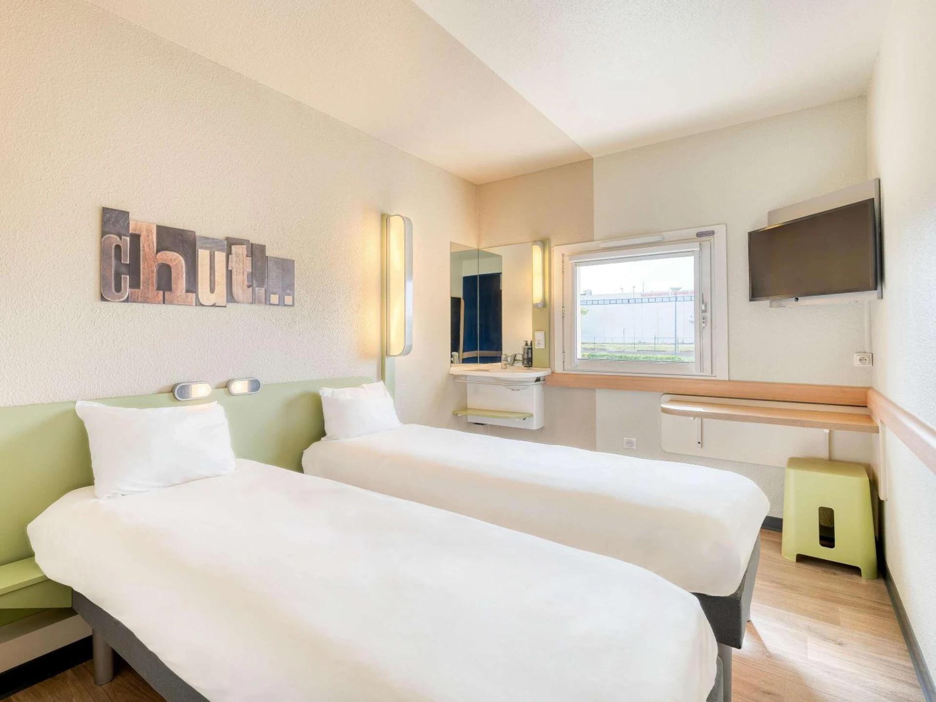 Chambre disponible pour un séminaire d'entreprise à ibis budget Versailles - Trappes - Trappes