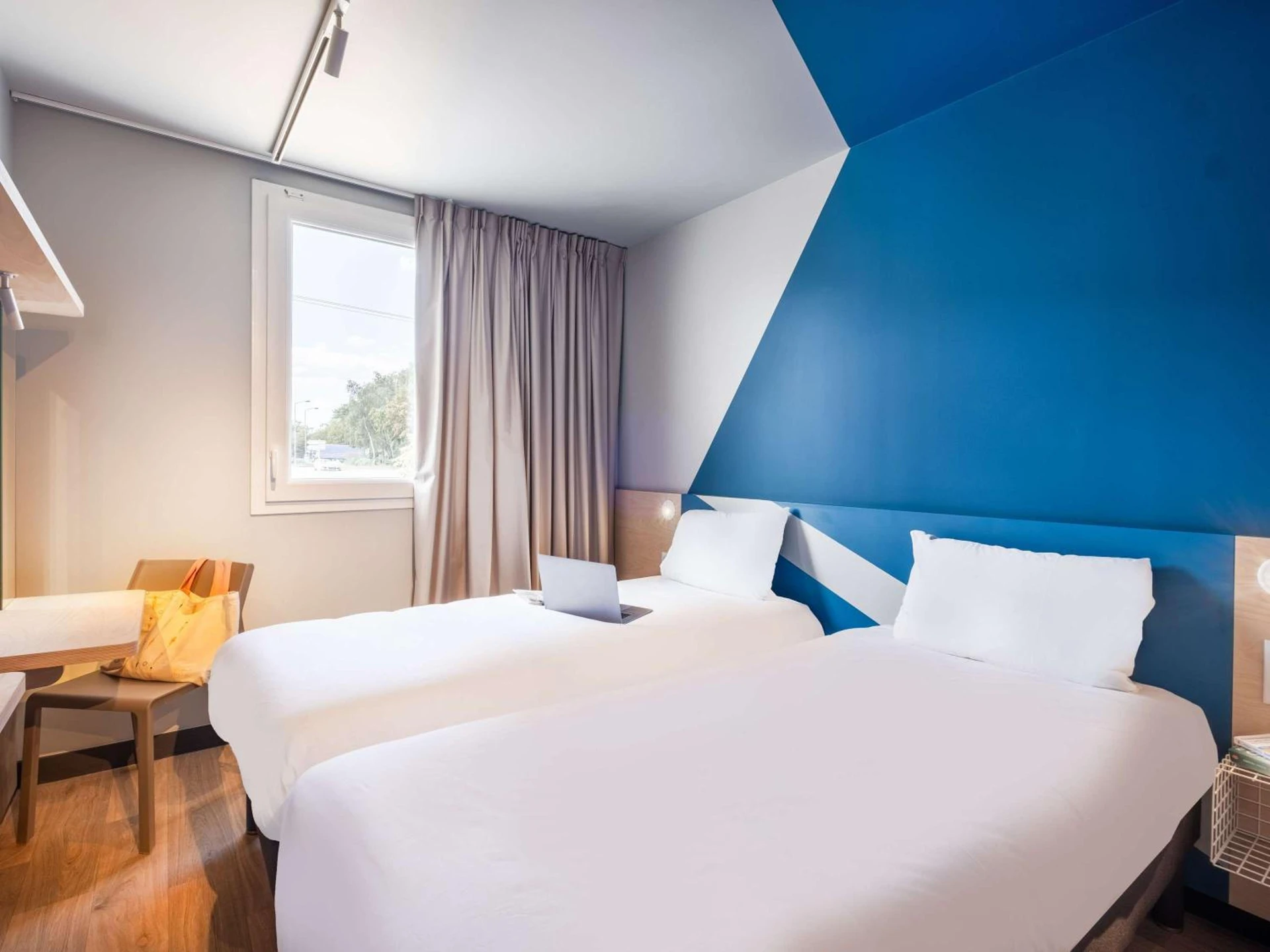 Chambre disponible pour un séminaire d'entreprise à ibis budget Nantes Nord Treillières - Treillières