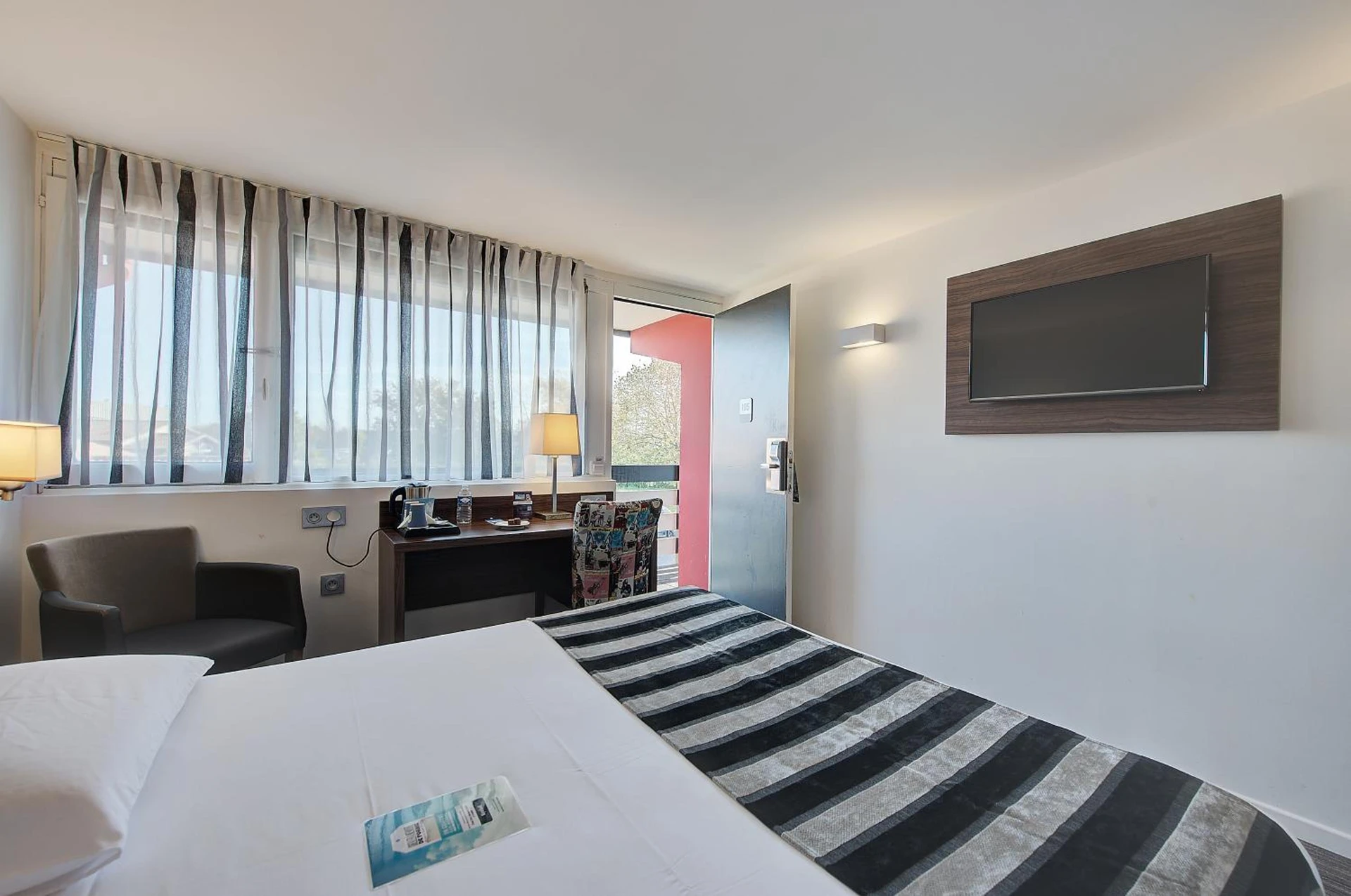 Chambre à Kyriad Bordeaux - Merignac Aéroport - Organiser un séminaire d'entreprise à Mérignac