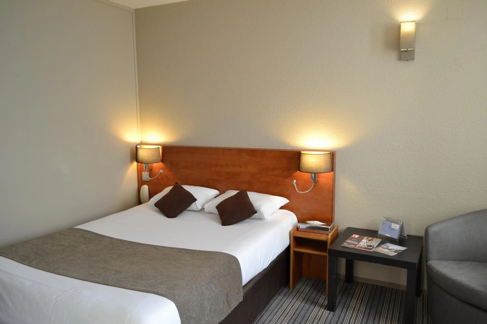 Chambre disponible pour un séminaire d'entreprise à Hotel Restaurant Kyriad Brive Centre - Brive-la-Gaillarde