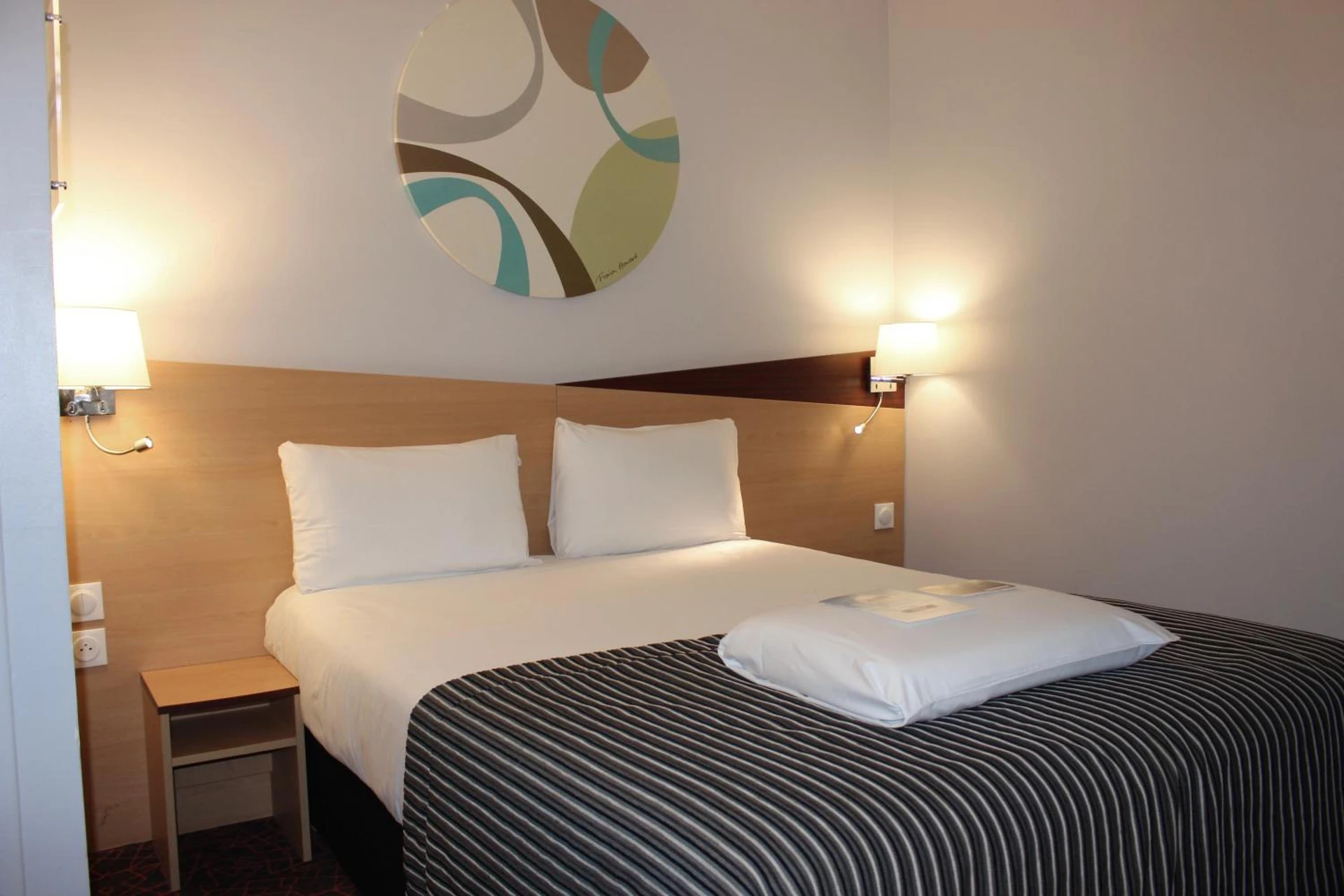 Chambre à Kyriad Hotel Dijon Gare - Organiser un séminaire d'entreprise à Dijon