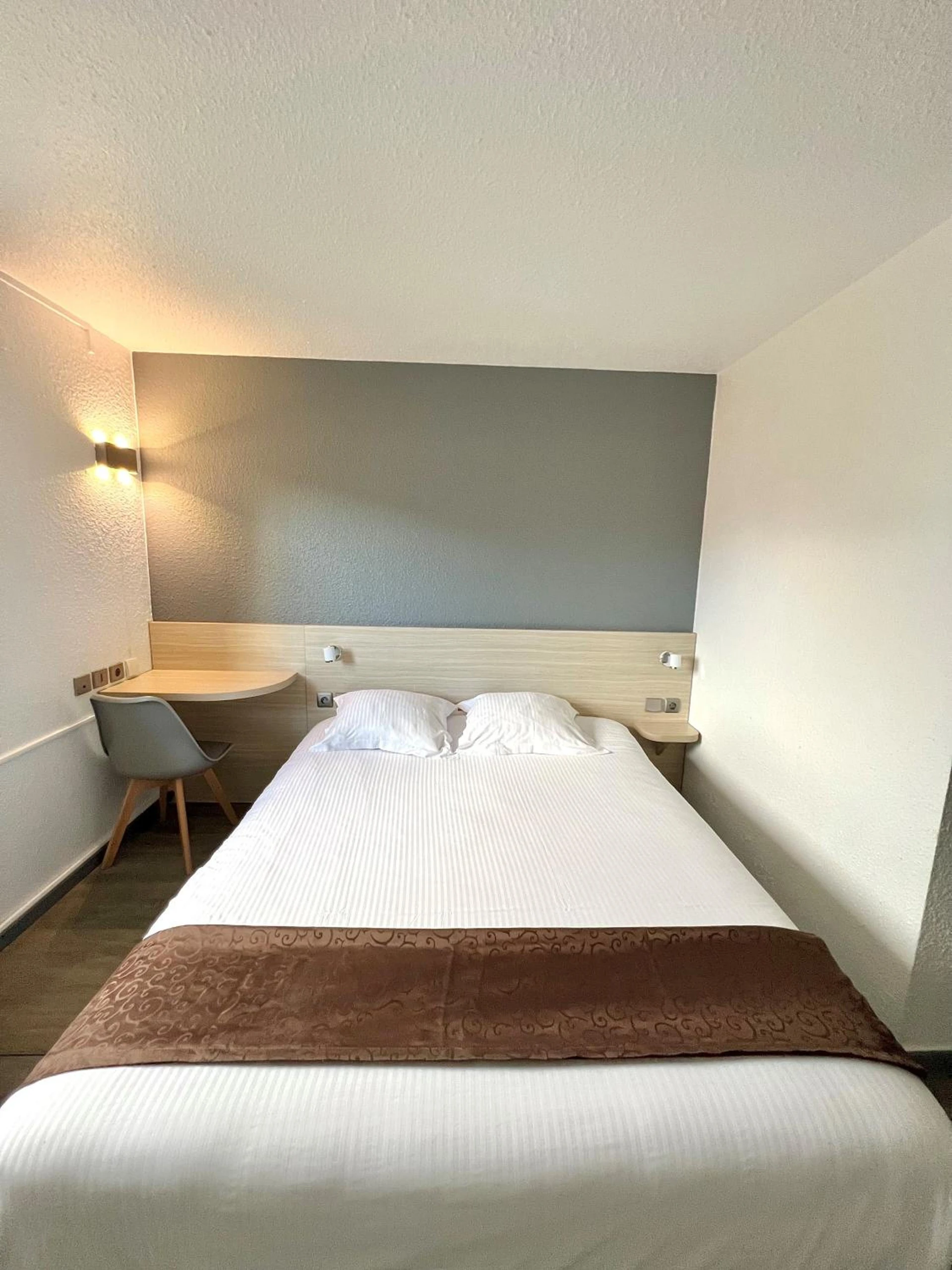 Chambre à Kyriad Direct Reims Bezannes - Organiser un séminaire d'entreprise à Reims