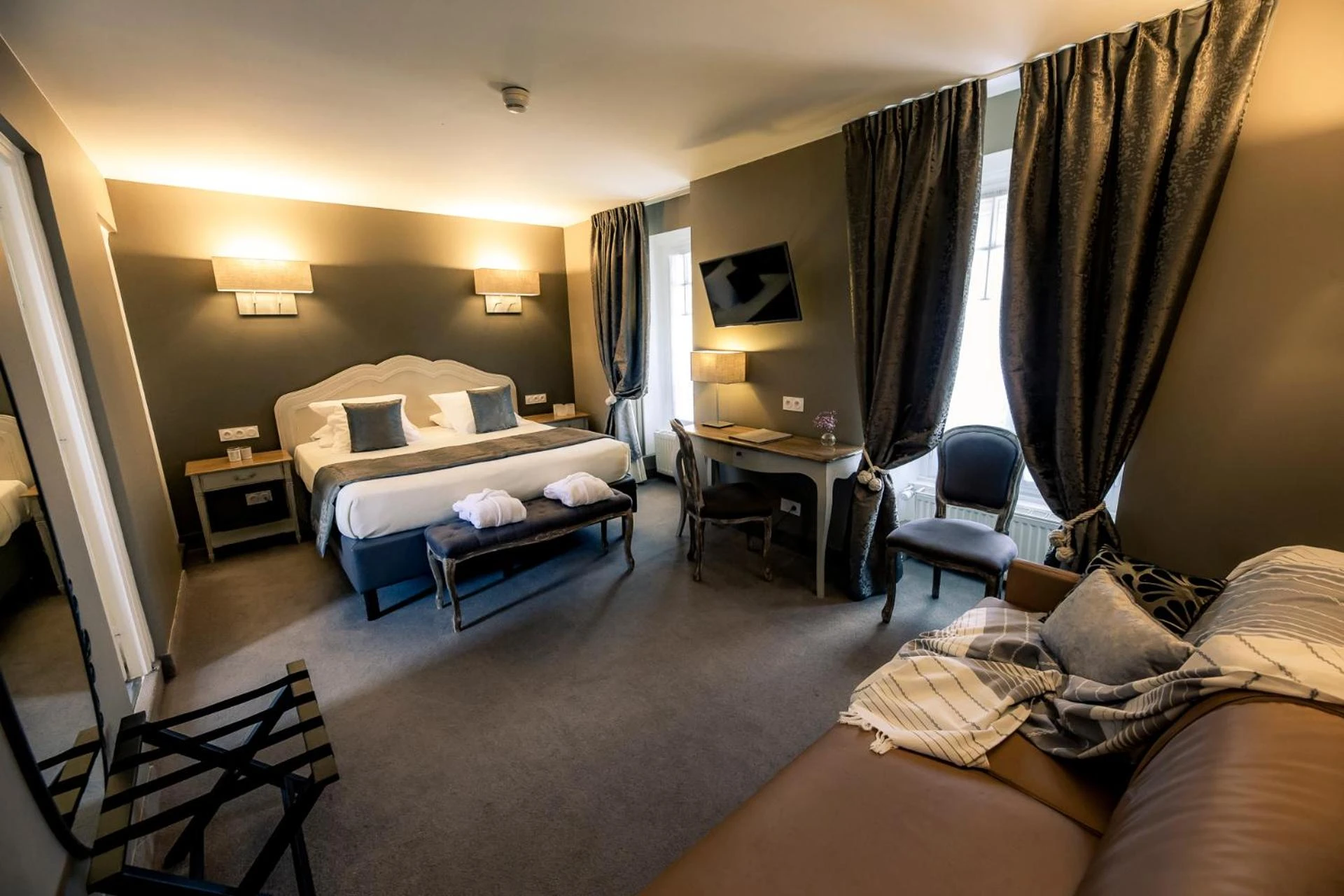 Magnifique chambre pour un séminaire d'entreprise à Hotel Le Lion D'Or et Restaurant La Table Du Lion - Bayeux