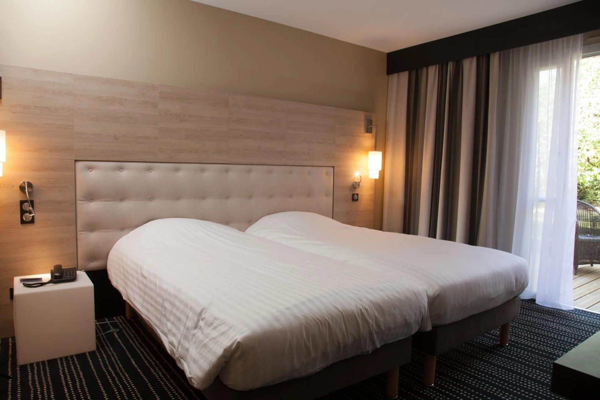 Magnifique chambre pour un séminaire d'entreprise à Logis LE RABELAIS Hôtel- Restaurant - SPA - Fontenay-le-Comte