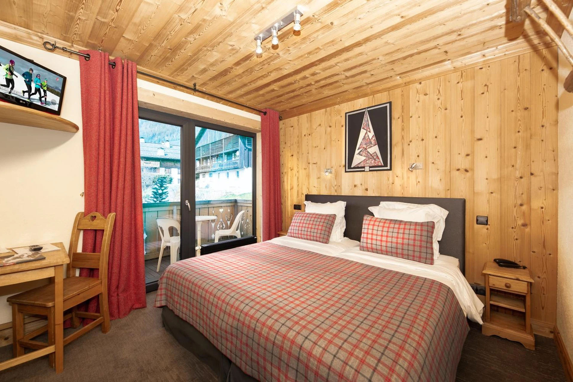 Chambre disponible pour un séminaire d'entreprise à Hôtel-Chalet Les Ecureuils Restaurant, Sauna & Spa Garage - Le Grand-Bornand