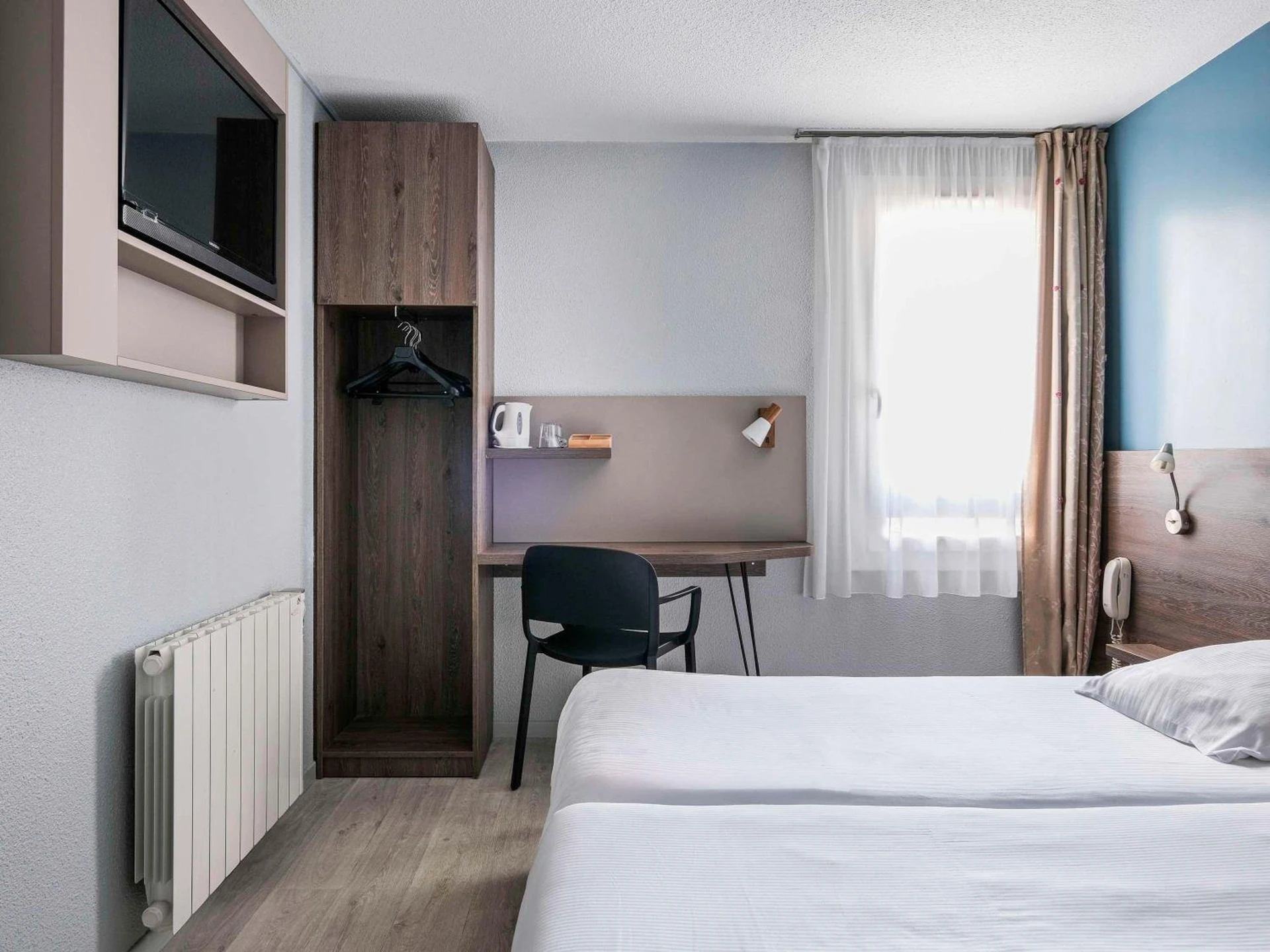 Chambre disponible pour un séminaire d'entreprise à greet Hotel Massieux Lyon Nord - Massieux