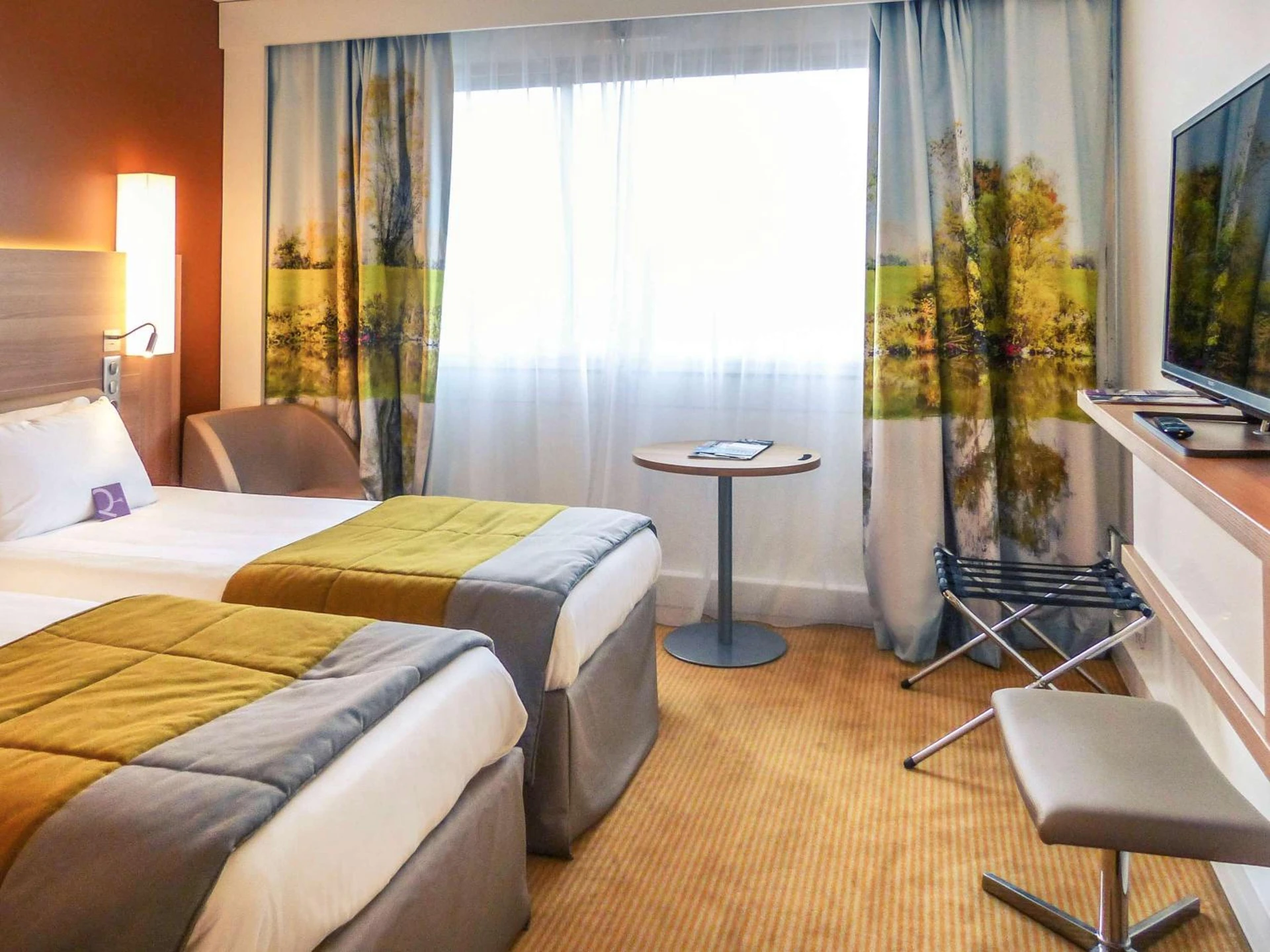 Magnifique chambre pour un séminaire d'entreprise à Hôtel Mercure Mâcon Bord de Saône - Mâcon