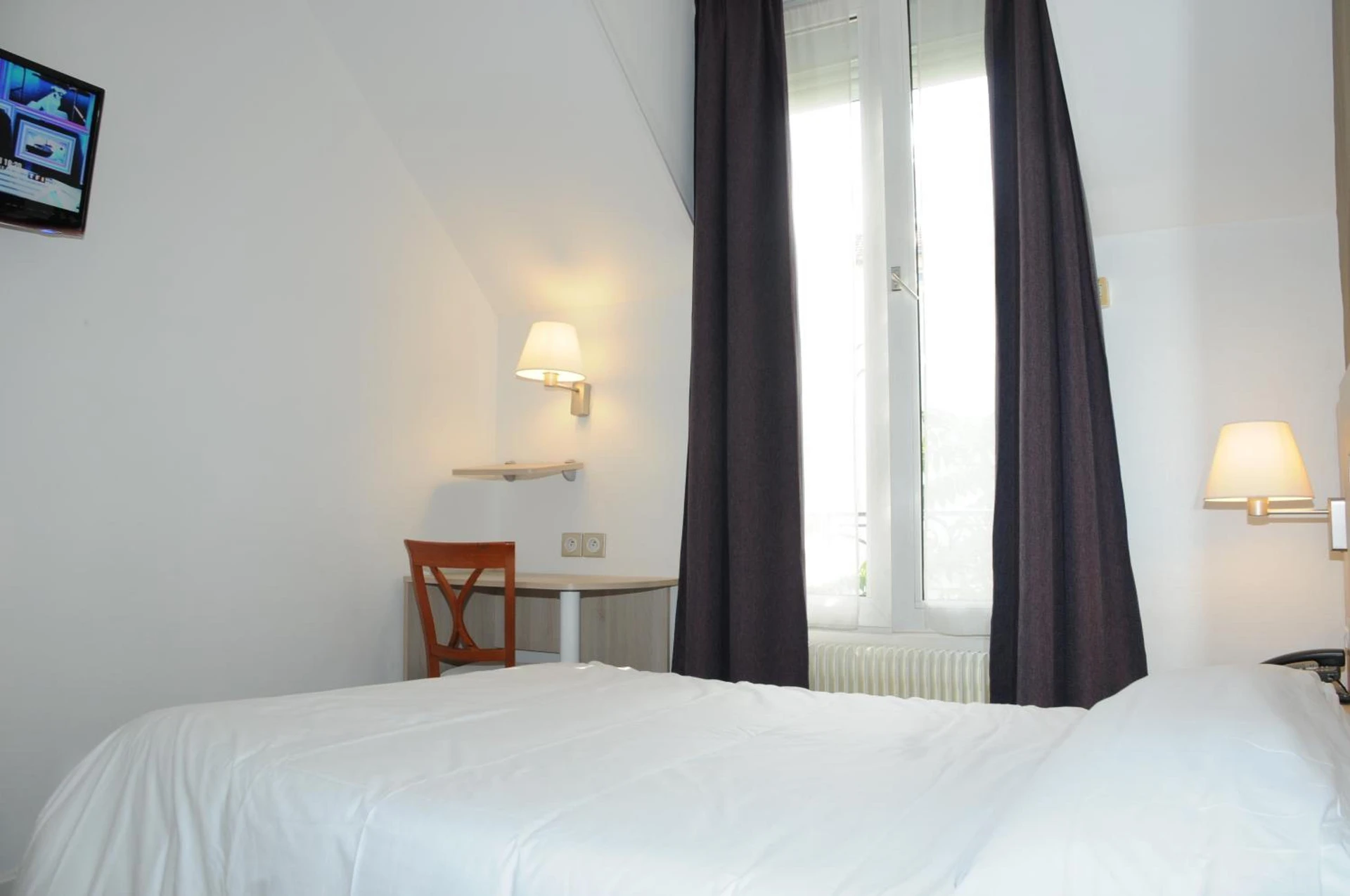 Chambre disponible pour un séminaire d'entreprise à Hôtel Patio Brancion - Malakoff
