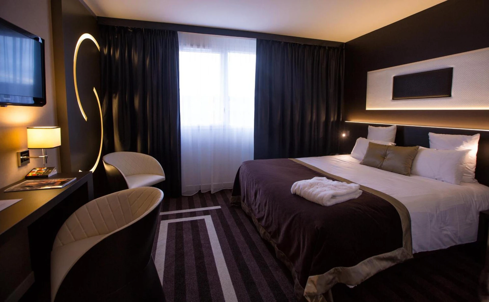 Magnifique chambre pour un séminaire d'entreprise à LE COLISÉE Hotel & Spa NANTES Saint Herblain - Saint-Herblain