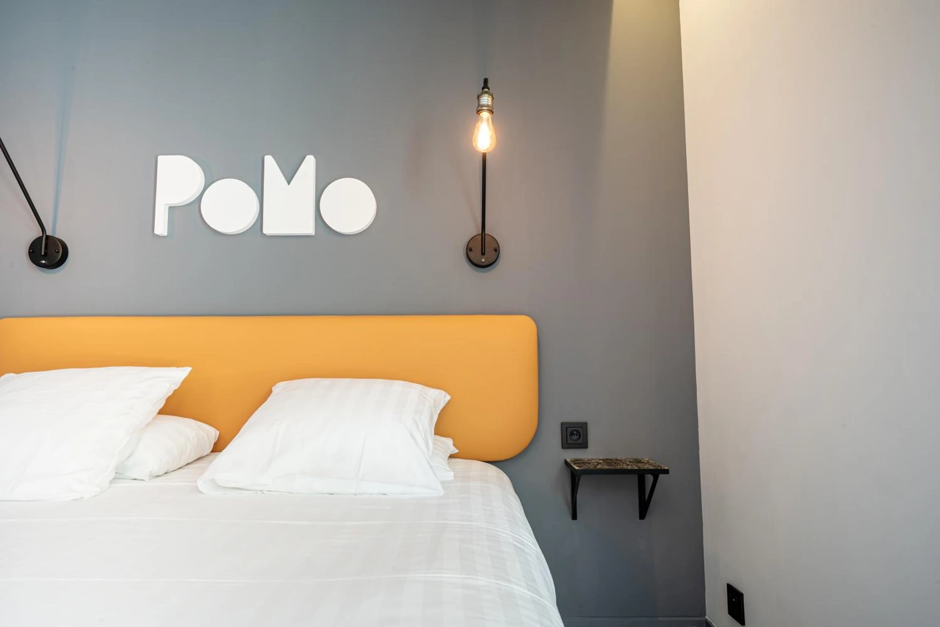 Chambre disponible pour un séminaire d'entreprise à PoMo Hôtel & Restaurant - Échirolles