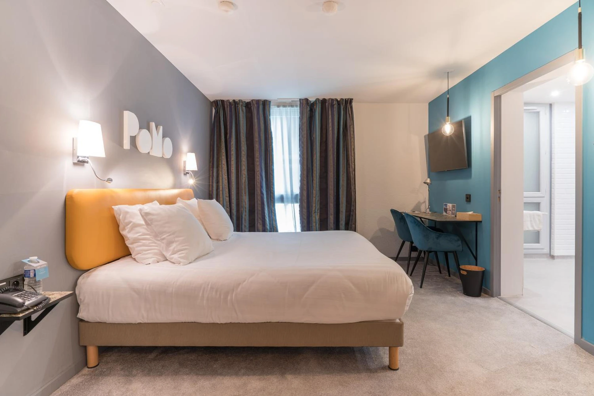 Chambre disponible pour un séminaire d'entreprise à PoMo Hôtel & Restaurant - Échirolles
