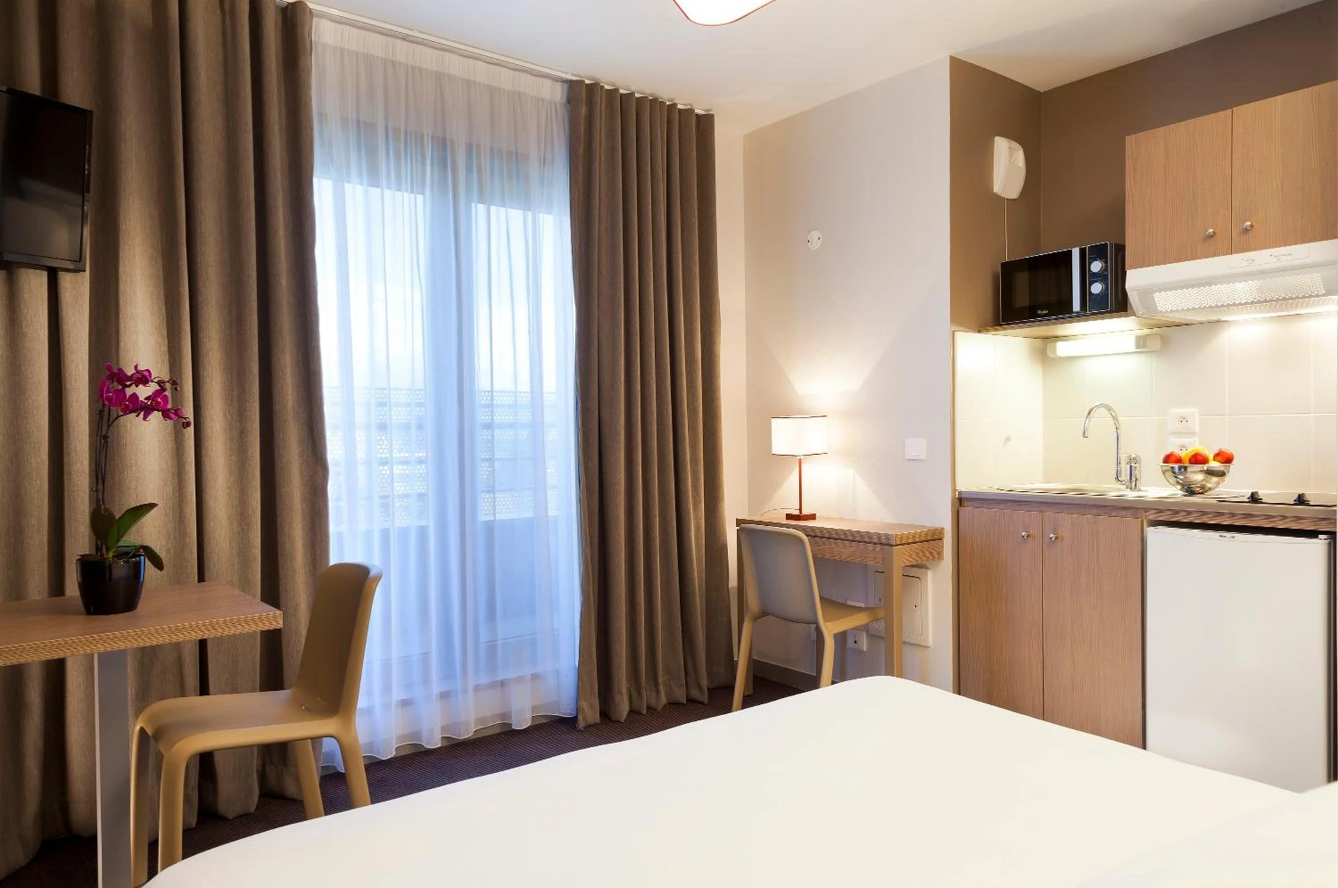 Salle de séminaire à Nehô Suites Porte de Genève - Gare Annemasse - Organiser un événement professionnel à Annemasse