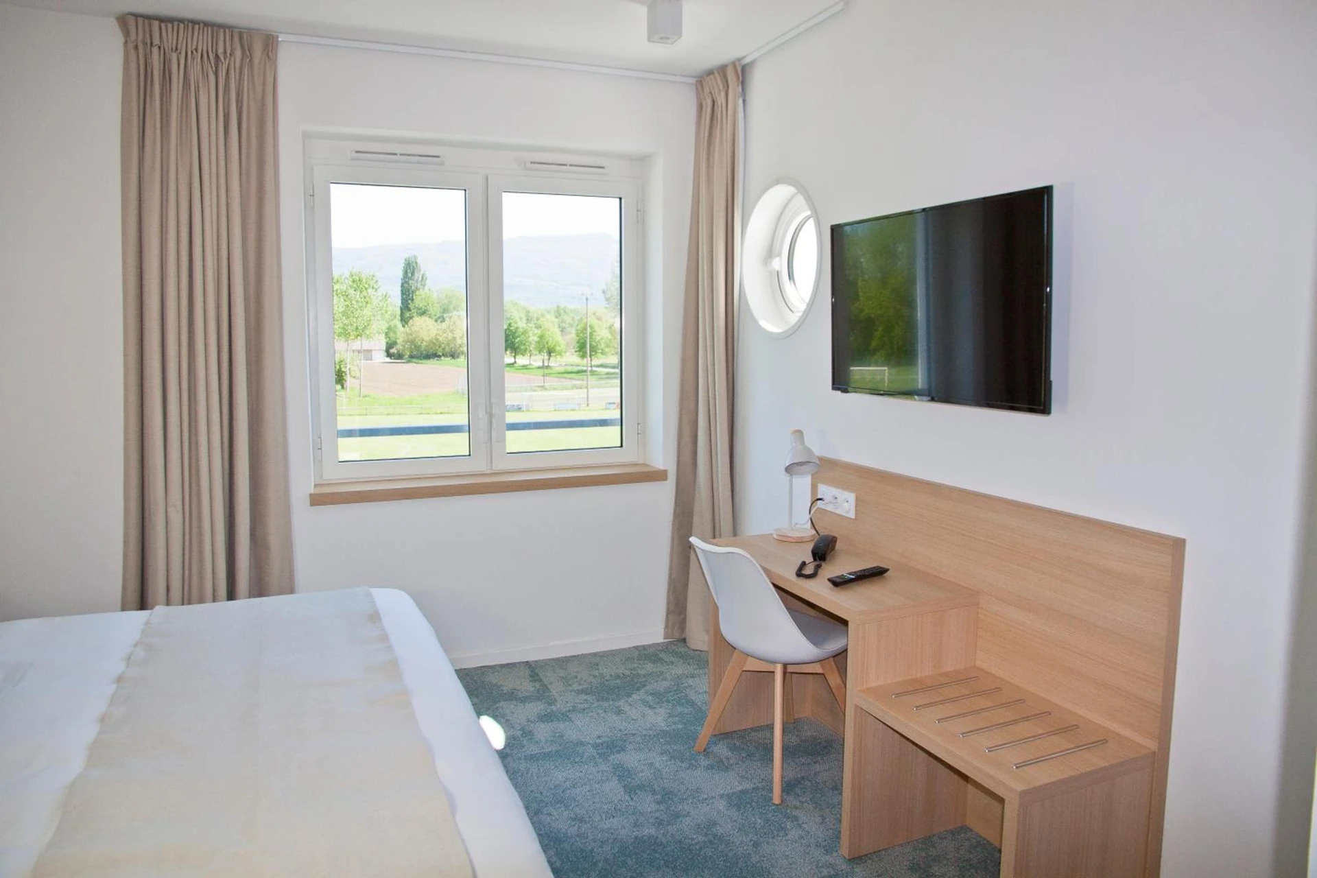 Magnifique chambre pour un séminaire d'entreprise à SHANA Hôtel & Résidence - Chanaz